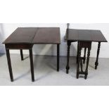 An early 19th century mahogany fold-over hall table, on gate leg and block supports,