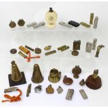 A large collection of WWI trench art cigarette lighters and table lighters to include examples with