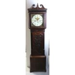 An early 19th century oak longcase clock, the broken swan neck pediment above square painted dial,