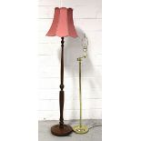 A reproduction mahogany standard lamp with turned and reeded column,