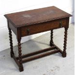 An early 20th century oak single-drawer side table on barleytwist supports, width 76cm.
