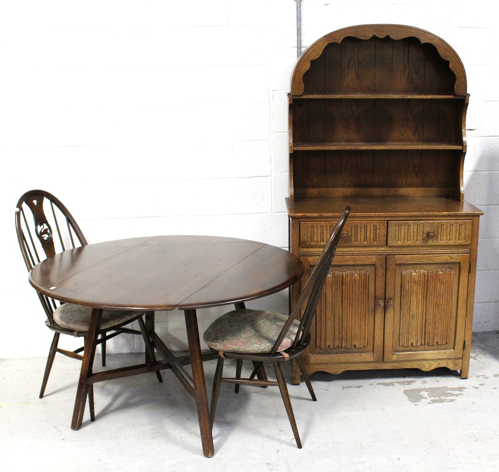 An early 20th century oak priory-style dresser of small proportions, width 97cm,