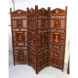 An Indian four-panel screen with lattice panels and panels hand-painted with Indian male and female