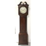 A late 18th/early 19th century oak and mahogany cross-banded longcase clock,