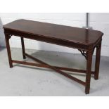 A contemporary mahogany hall table in the Oriental style,