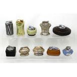 Ten vintage table cigarette lighters to include Ronson examples, onyx examples,
