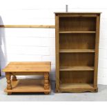 A pine bookcase with three shelves, height 151cm, width 84cm and a pine coffee table,