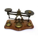 A set of 'Rev JHS' postal scales and weights.