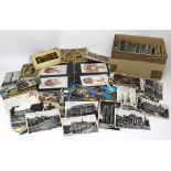 An Edwardian postcard album containing WWI documentary postcards, a quantity of Edwardian postcards,