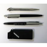 A cased Parker ballpoint pen with integral converter to decimal currency,