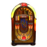 An exceptionally rare 1941 Wurlitzer Peacock jukebox imported to the UK to entertain American