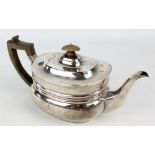 EDWARD BARNARD & SONS LTD; a Victorian hallmarked silver oval teapot with triple band detail,