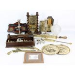 A mixed lot of metalware to include a pair of silver plated candlesticks,