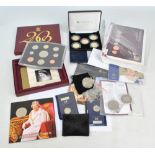 A collection of coins to include a boxed Royal Mint 2002 proof collection with certificate of