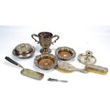 A small group of electroplated items to include a circular muffin dish,