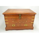 A 19th century camphorwood and inlaid brass box/trunk with campaign style handles,