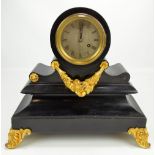 A late 19th century black slate mantel clock with gilt mounts,