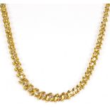 A 14ct yellow gold and diamond set Riviera necklace with 105 graduated diamonds totalling approx 4.
