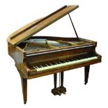 A Challen walnut cased baby grand piano, royal appointment decal to interior,