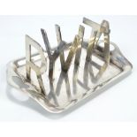 J H POTTER OF SHEFFIELD; an electroplated twin handled five sectioned toast rack,