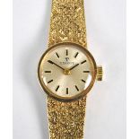 TISSOT; a 9ct yellow gold mechanical lady's cocktail wristwatch,