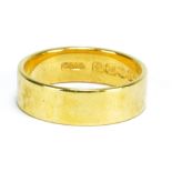 An 18ct yellow gold wedding band, size P1/2, approx 6.3g.