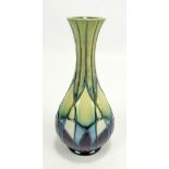MOORCROFT; a geometric patterned tubeline decorated vase,