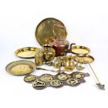 A mixed lot of metalware to include a copper and brass kettle, horse brasses,