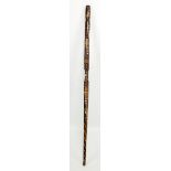 A wooden swagger stick with inlaid mother of pearl detail, length 61.5cm.