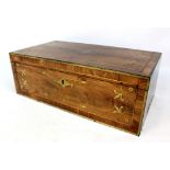 An early 19th century brass bound writing slope with twin campaign style handles,