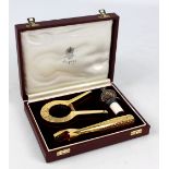 ASPREY; a boxed electroplated three piece bottle opening set.