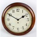 An Enfield wall clock, the circular dial set with Arabic numerals, dial diameter approx 29cm,