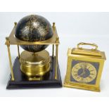 A brass Royal Geographical Society clock, 1980, height 28cm, and a 'Quartzmatic' mantel clock (2).