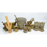 A group of various brass pestles and mortars,