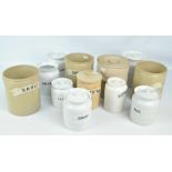 A collection of early 20th century and later kitchen storage jars to include a set of three