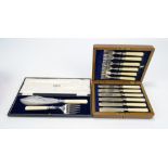 An oak cased set of six electroplated and ivorine handled fish knives and forks,