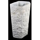 KAISER; a large lozenge moulded matt white glazed fossilized shell decorated vase,