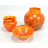 ROYAL LANCASTRIAN; three mottled orange glazed pieces comprising a globular vase,