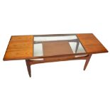 A G-Plan rectangular coffee table with part glazed top, width 137.5cm, height 43cm.