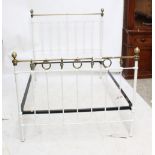 A Victorian cream painted cast iron and brass double bed frame, 139 x 201cm.