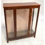 A single door glazed display cabinet, width 84cm, height 101cm.