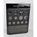 A Bell & Ross shop display backboard for watches set with thirteen military aircraft style dials,