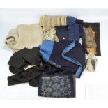 A quantity of Japanese textiles and garments including obi, dress, etc.