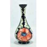 MOORCROFT; a 'Poppy' pattern tubeline decorated bottle vase,