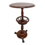 A Victorian mahogany circular occasional table on ring turned baluster column on base with three