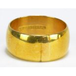 A 9ct yellow gold wedding band, size V, approx 9.6g.