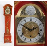 A reproduction red lacquered chinoiserie grandmother clock with arched dial and three chain