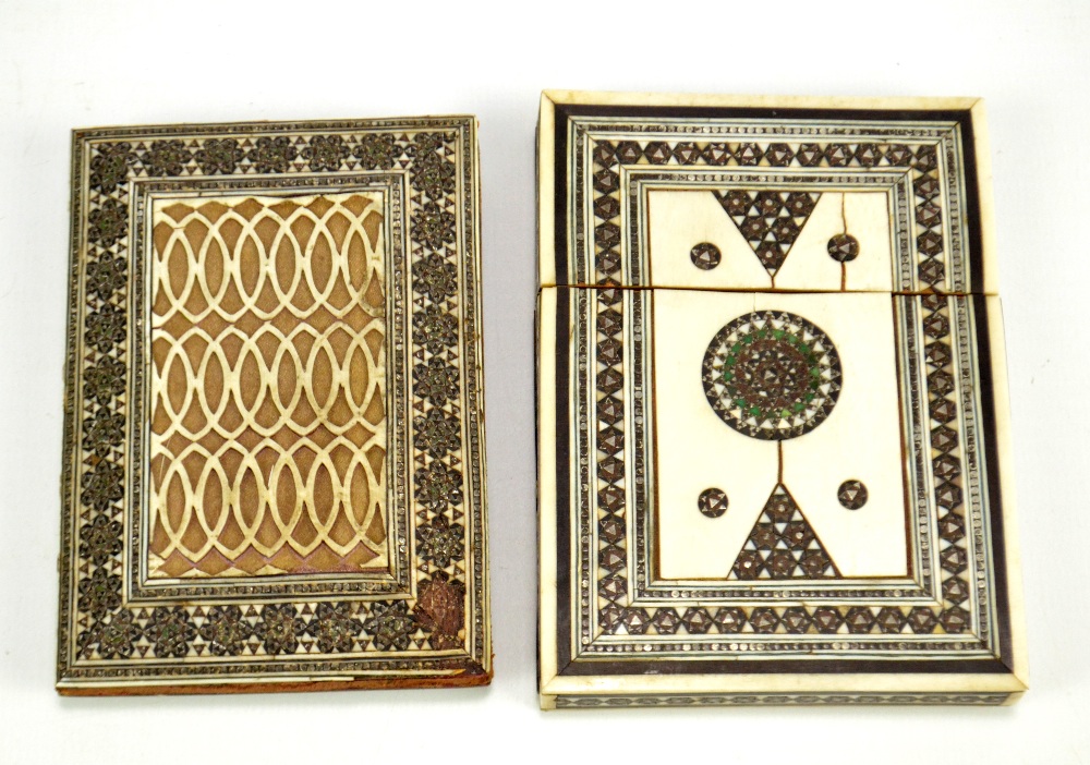 An Anglo-Indian inlaid ivory card case and a card wallet with leather interior, the larger 10.3 x 7.