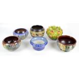 BRETBY; six small jardinières/bowls, one embossed with floral sprays, two blue ground,