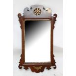 A walnut Chippendale style fretwork rectangular wall mirror, height 69.5cm.